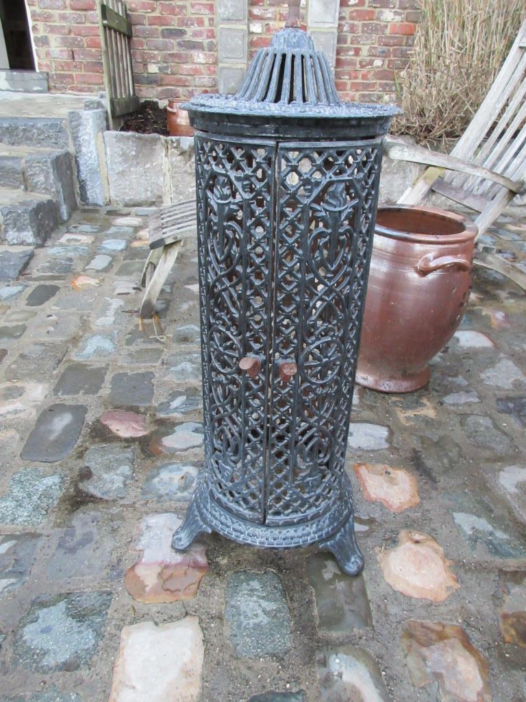 Exérieur d'un poele en fonte, Antiquités & Art, Enlèvement