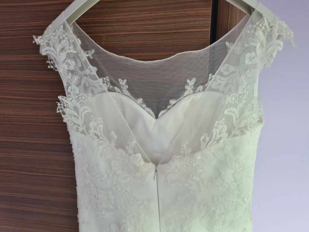 Nieuwe trouwjurk Linea Raffaelli maat 42, Ophalen, Trouwjurk