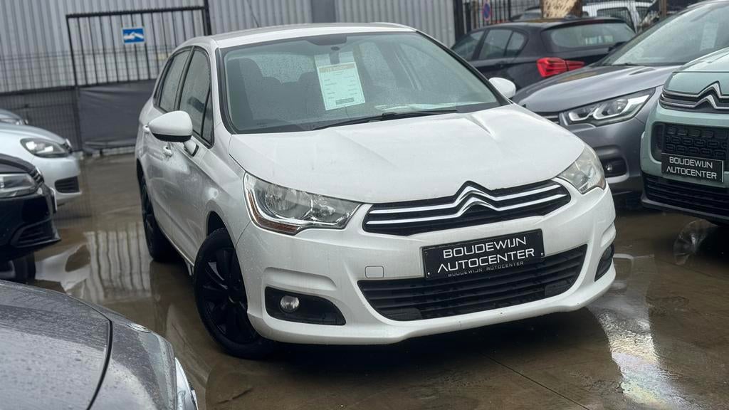 Citroën C4 1.4Benzine 2012 151.xxxkm/Airco,Cruisecontol, Auto's, Voorwielaandrijving, Stof, Zwart, Wit