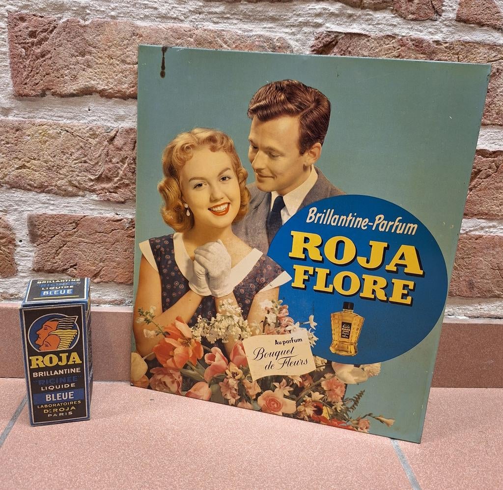 Blikken reclame 1950's ROJA Flore Brillantine + flesje, Ophalen of Verzenden, Gebruikt, Reclamebord
