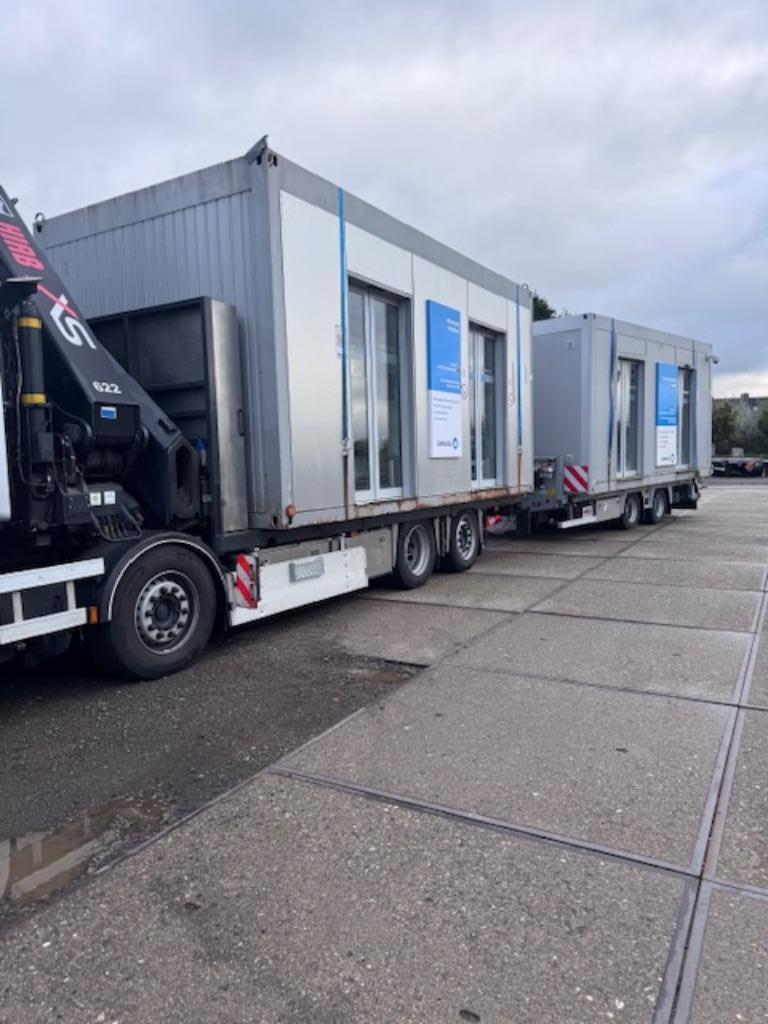 Transport en plaatsen van containers, Ophalen