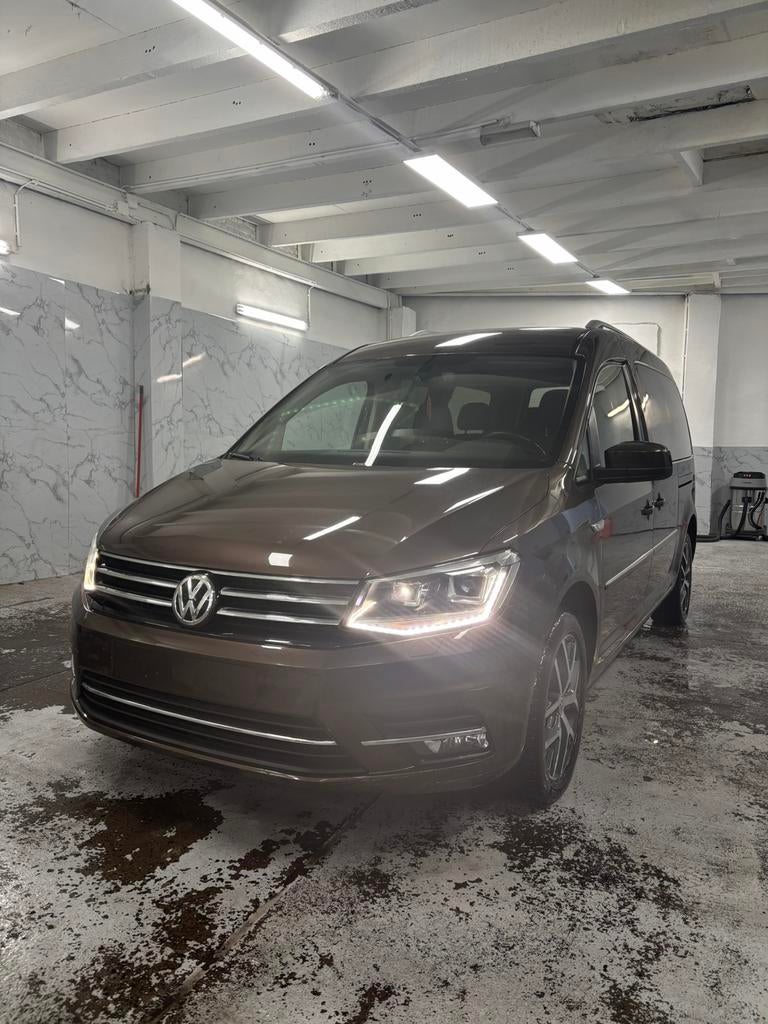 Volkswagen Caddy Maxi Highline TPMR, Auto's, Automaat, Monovolume, Bruin, Alcantara