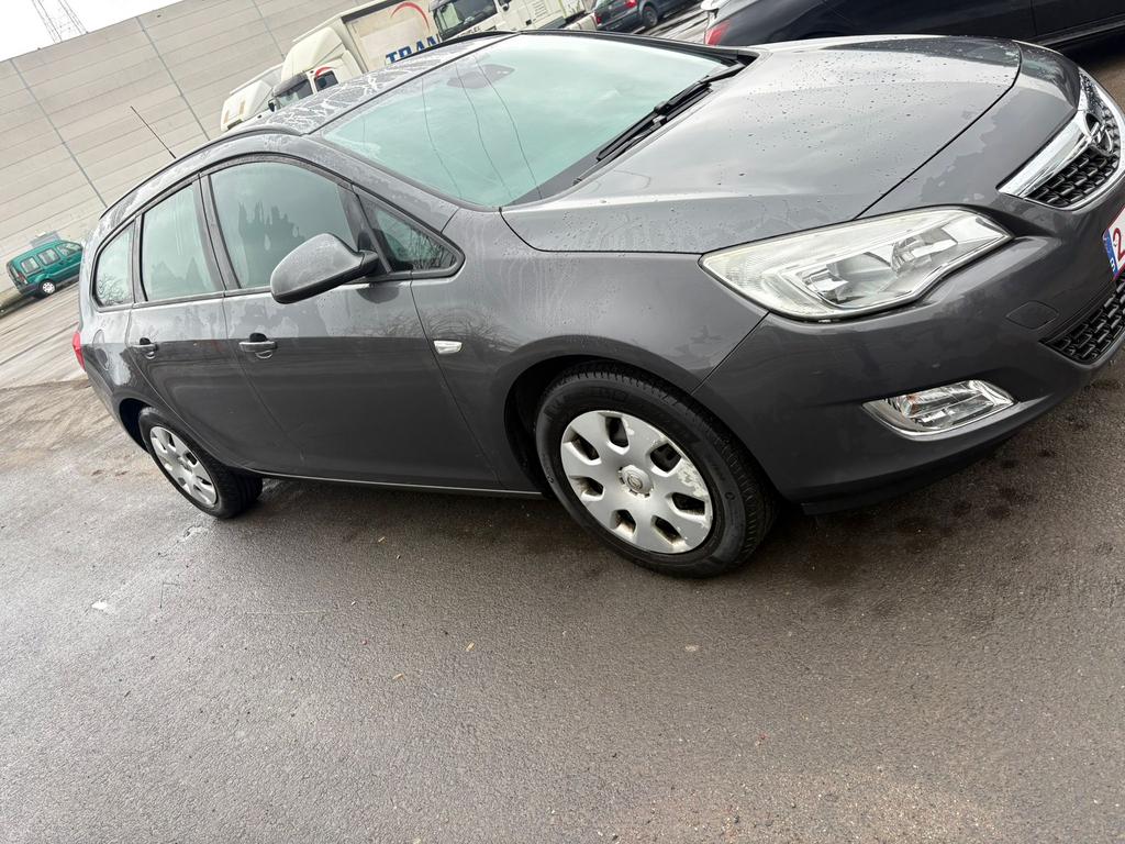 Opel Astra 2011 benzine euro 5, Auto's, Euro 5, Bedrijf, 5 deurs, Dealer onderhouden