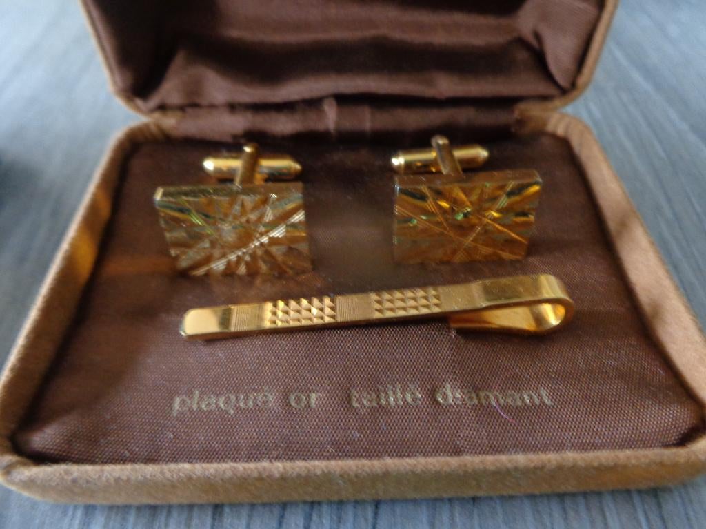 manchetknopen - dasspelden, Ophalen