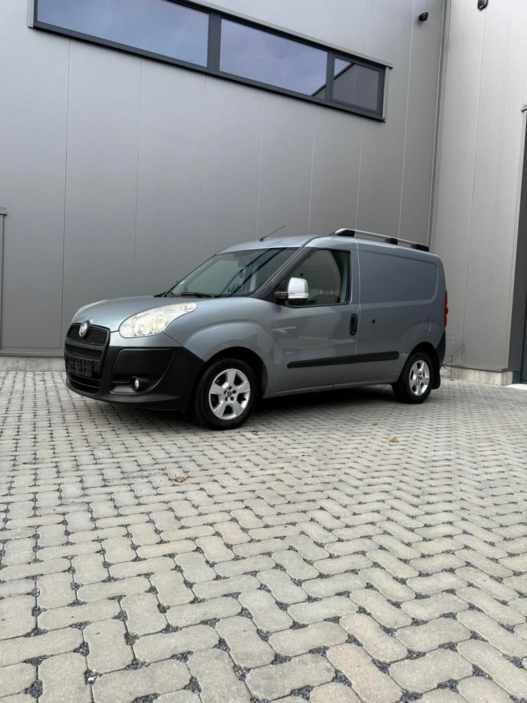 Fiat doblo 1.3|euro5|gvv|navi|cruisecontrol|aluvelgen.., Auto's, Voorwielaandrijving, Euro 5, Stof, Parkeersensor