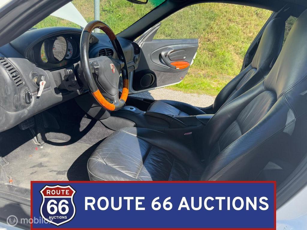 Porsche 911 Carrera 4S Coupe | 2003 | Route 66 Auctions, Auto's, Porsche, Gebruikt, Zwart, Bedrijf, Handgeschakeld