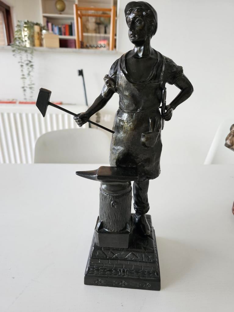 beeld in  (zamak) smid, Enlèvement ou Envoi