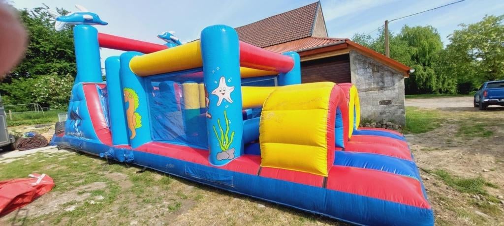 LOCATION: Château gonflable Dauphin Obstacles, Hobby & Loisirs créatifs, Enlèvement, Utilisé