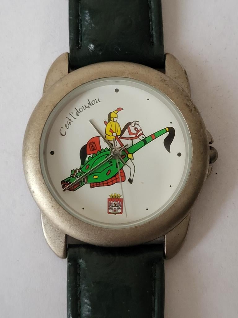 Vintage - Montre effige ducasse L'DouDou Mons - 18/06/2000, Collections, Collections Autre, Enlèvement ou Envoi