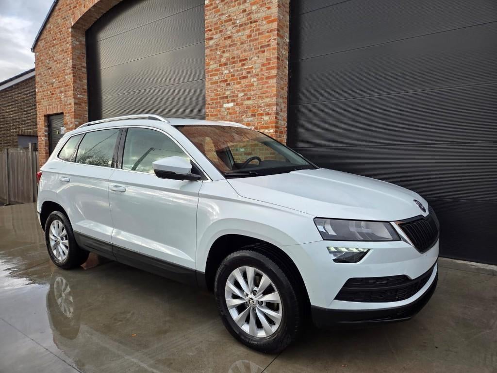 Skoda Karoq/Hoge instap/Automaat/Benzine/GARANTIE/1.5L, Auto's, Stof, USB, 4 cilinders, Wit