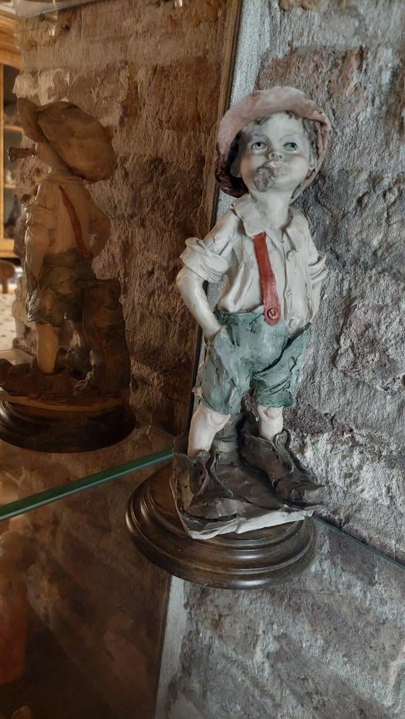 beeld van jongen met pijp, Ophalen