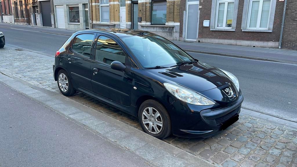 Peugeot 206+ 1.1 benzine, Auto's, Peugeot, Voorwielaandrijving, 206+, Stof, Zwart