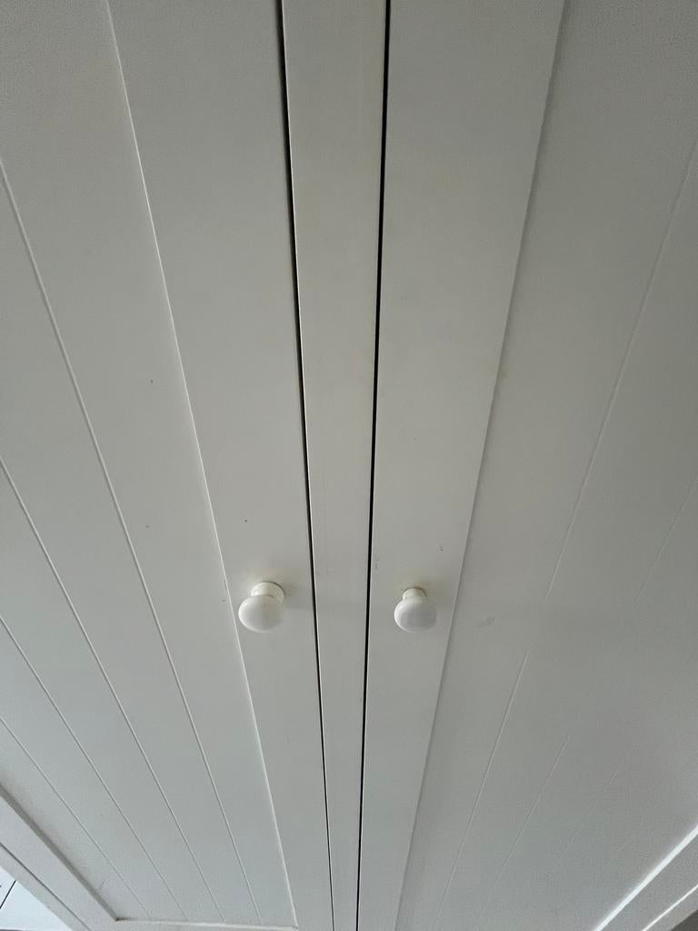 Hoge WITTE kast, Ophalen