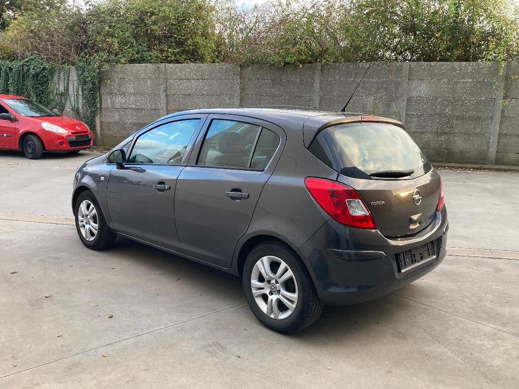 Opel Corsa 1.4 benzine 2012 met 119000km*GPS*GARANTIE, Auto's, Euro 5, Stof, 4 cilinders, Bedrijf