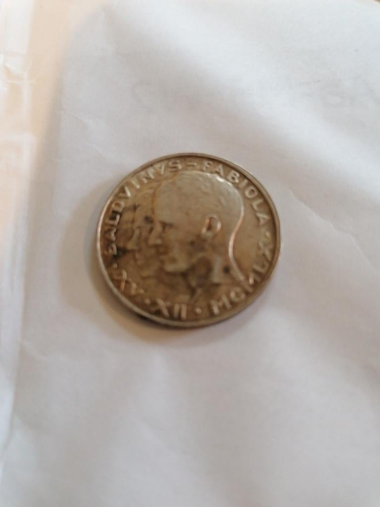 Cette pièce est un 50 franc belge de 1960, Enlèvement