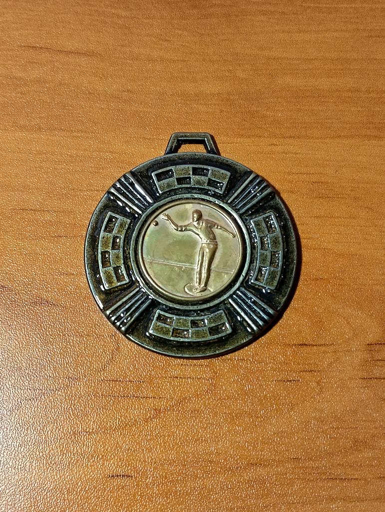 Vintage petanquemedaille, Ophalen