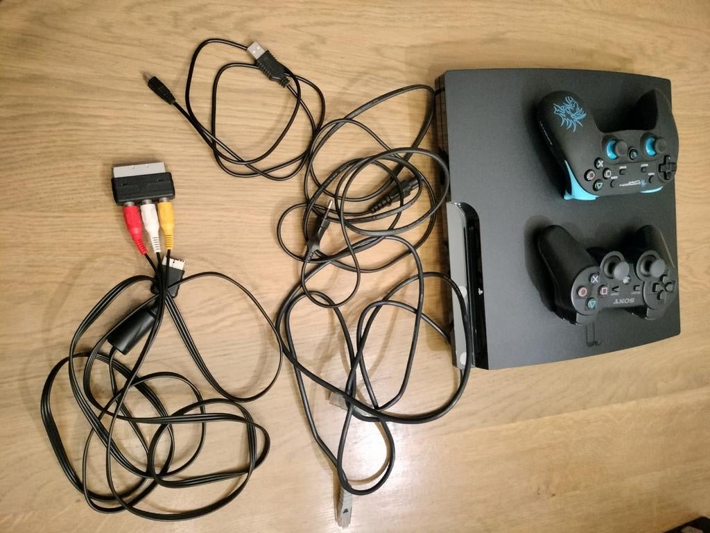 PS3 + 2 controllers & kabels + 12 spellen en move bundle, Ophalen, Met 2 controllers, Slim, Met games