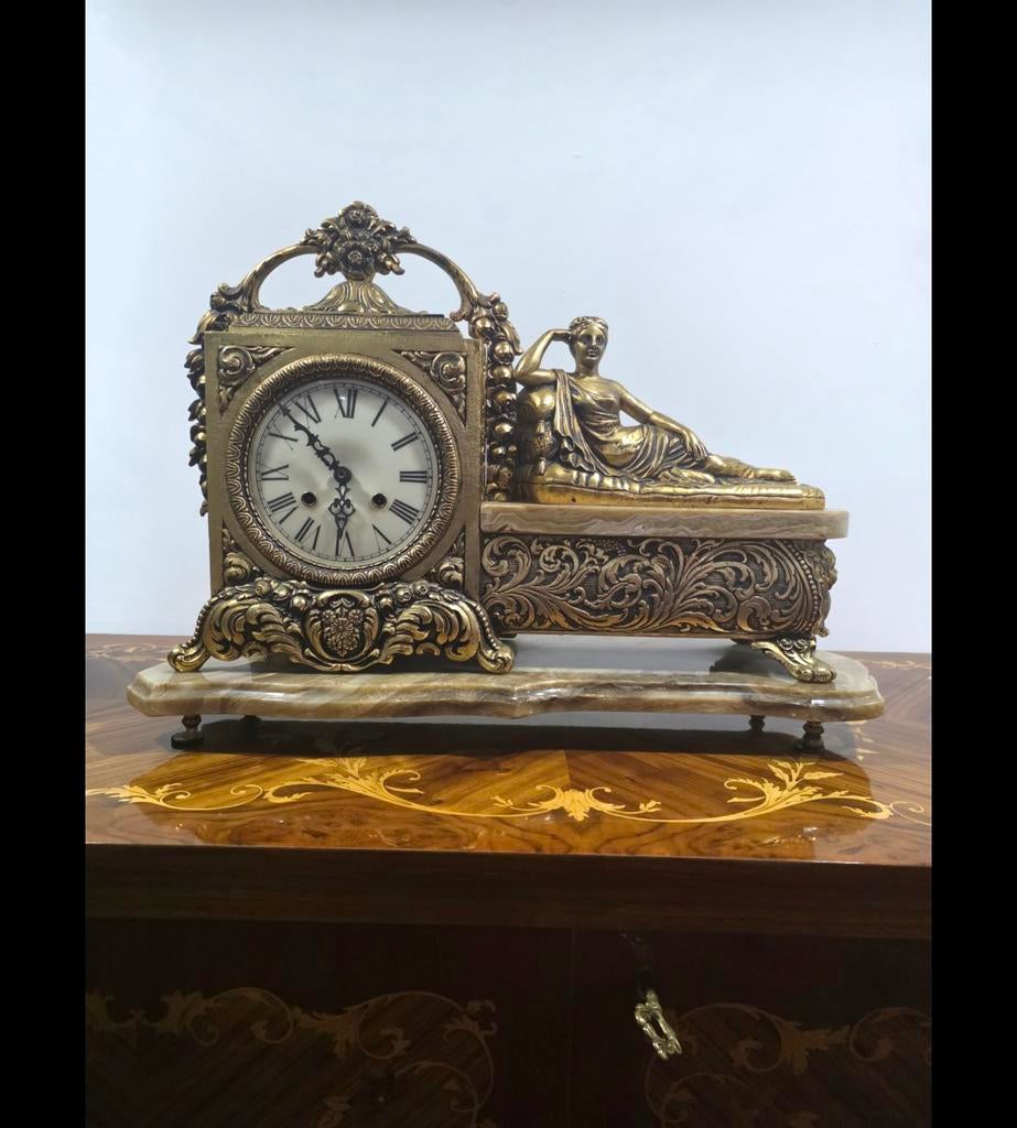 klok is vervaardigd uit verguld brons 55 cm op 40 cm hoog, Ophalen