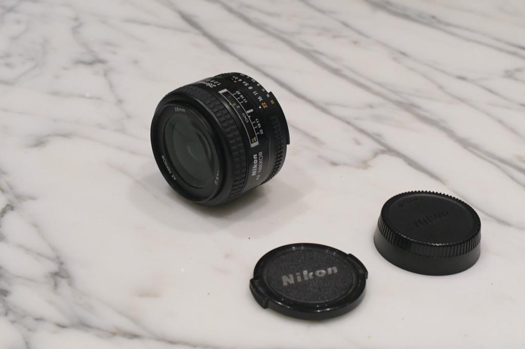 Nikon 28 mm f/2.8D N 460086, Enlèvement ou Envoi, 1980 à nos jours, Lentille ou Lentilles