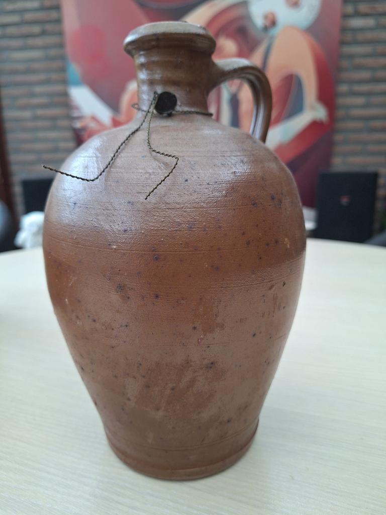 Un vieux pot à gin., Enlèvement