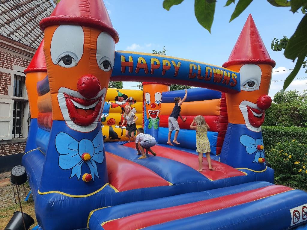 Groot professioneel springkasteel “Happy Clowns”, Ophalen, Zo goed als nieuw, Feestartikel