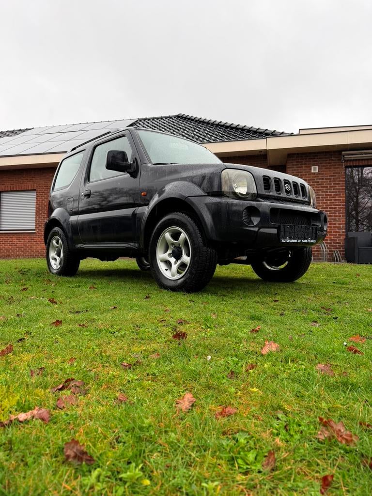Suzuki Jimny JLX*1.3Benzine*4x4*, Auto's, Suzuki, 4 zetels, 63 kW, Zwart, Bedrijf