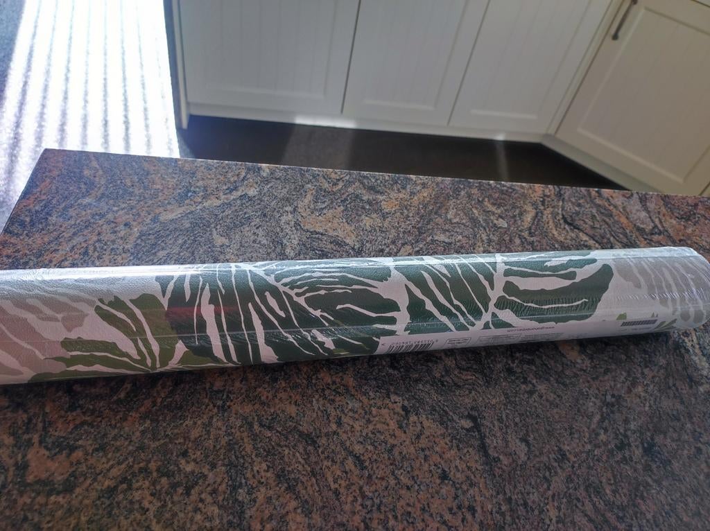 Mooi behangpapier, Ophalen