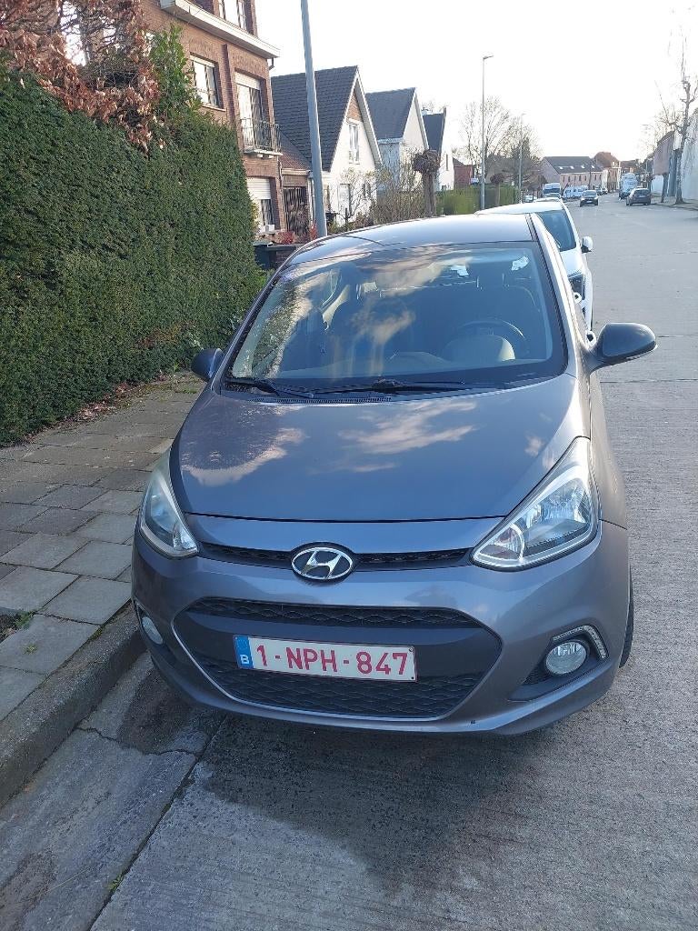 Hyundai i10 Sky 1.2 MT5 benzine, Voorwielaandrijving, 4 cilinders, Leder en Stof, 5 deurs