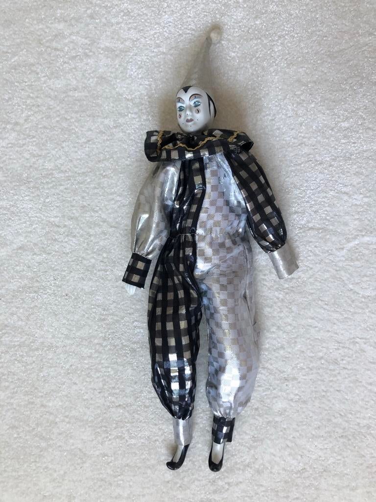 Pierrot noir et argenté, Collections, Comme neuf