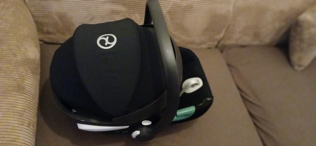 Autostoel baby van het merk Cybex, Ophalen