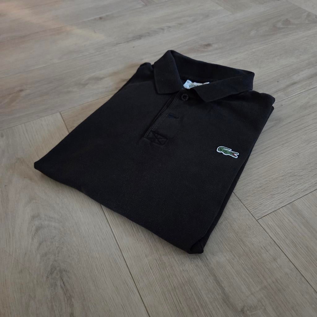 Polo Lacoste noir élégant taille XS, Envoi