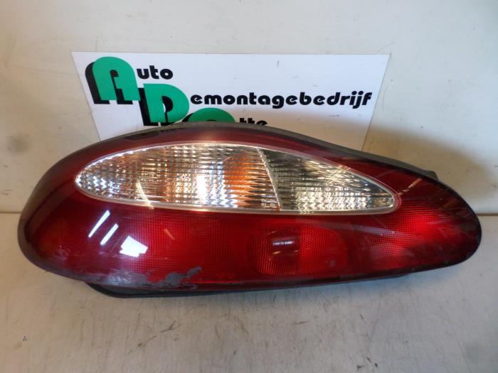 Feu arrière gauche d'un Hyundai Coupe (Coupe 96-), -, 3 mois de garantie, Utilisé, Hyundai