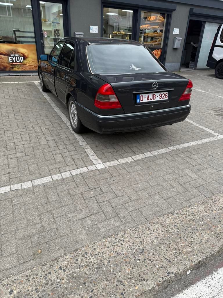 Mercedes C200 oldtimer, 230000km, bouwjaar 1994, Auto's, Oldtimers, Automaat, Stof, Zwart, Zwart