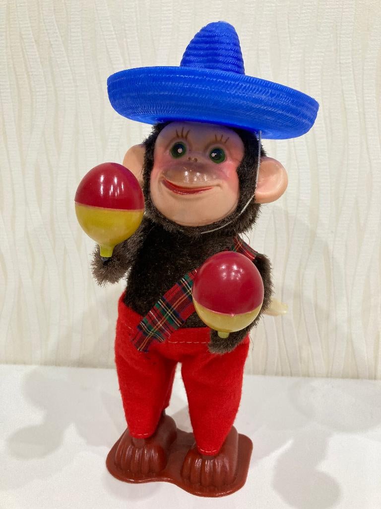 Mechanisch opwindbaar aapje met maracas en sombrero, Antiek en Kunst, Ophalen of Verzenden