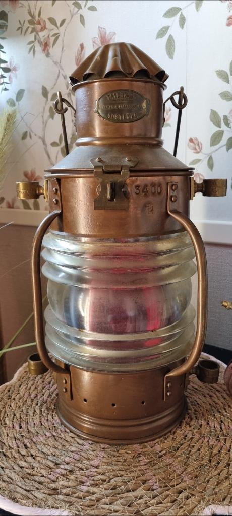 Antieke koperen bakboord scheepslamp, Ophalen