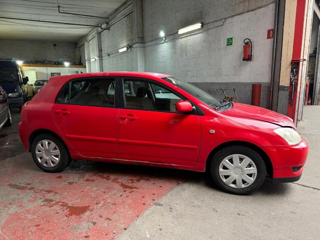 TOYOTA COROLLA DROGBA 115, Autos, Rouge, Boîte manuelle, Corolla, Noir