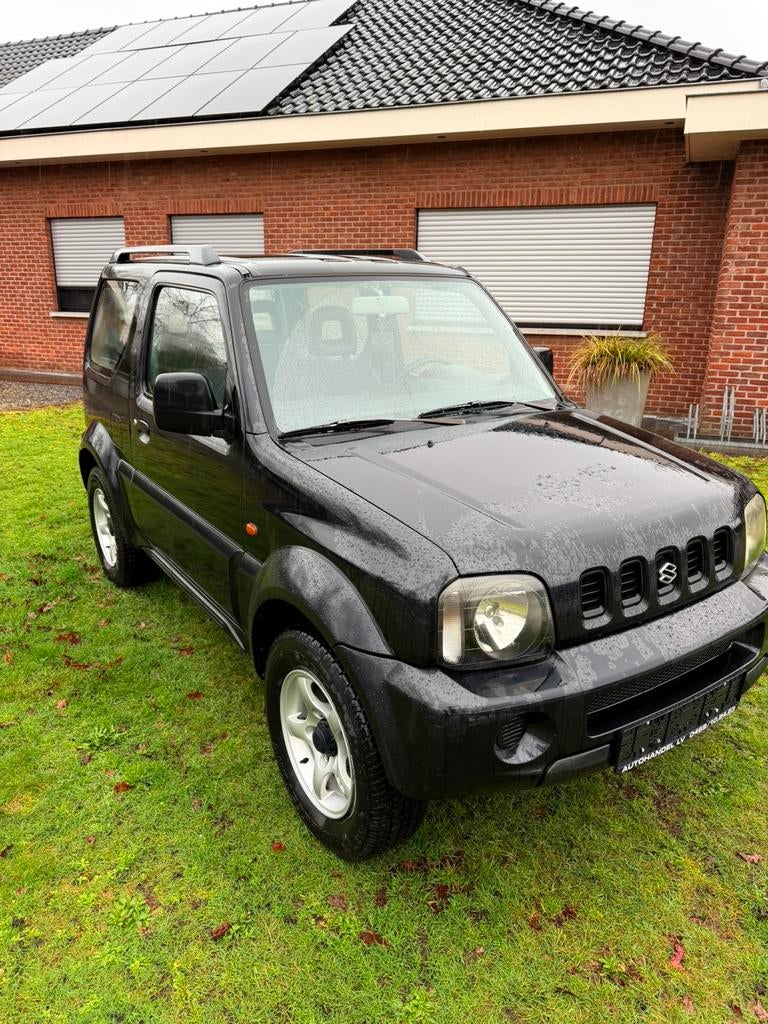 Suzuki Jimny JLX*1.3Benzine*4x4*, Auto's, Suzuki, 4 zetels, 63 kW, Zwart, Bedrijf