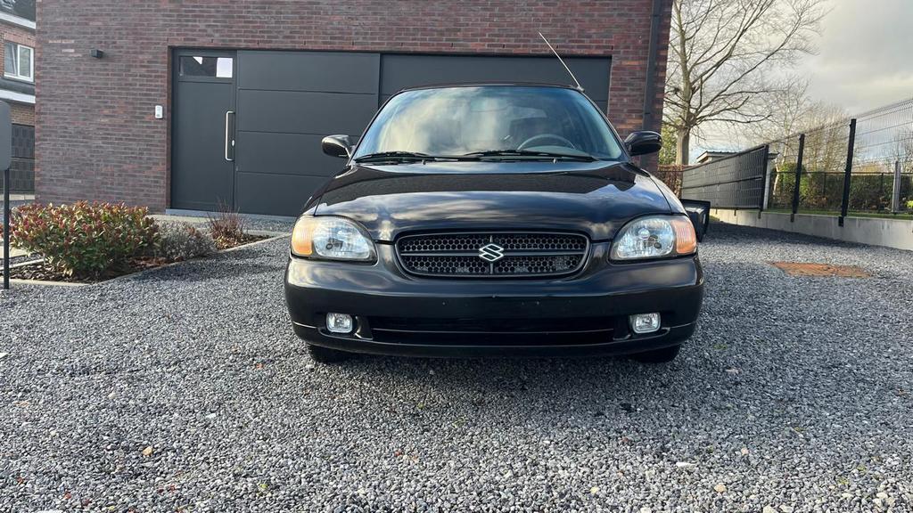 Suzuki Baleno 1.3 benzine, 57.000 kilometres, 2004 bouwjaar, Auto's, Suzuki, 63 kW, Baleno, Zwart, Bedrijf