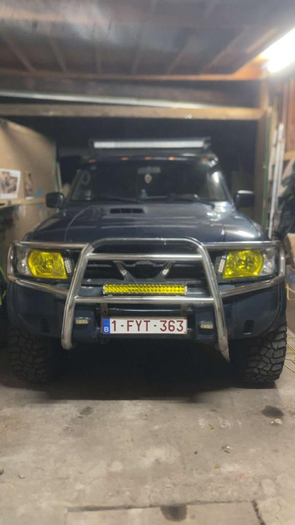 nissan patrol y61, Auto's, Blauw, Leder en Stof, Patrol, Vierwielaandrijving