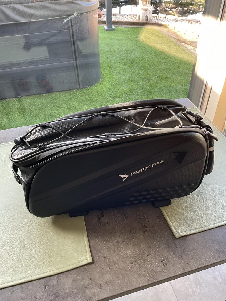 Bagagetas voor op de fiets, Ophalen