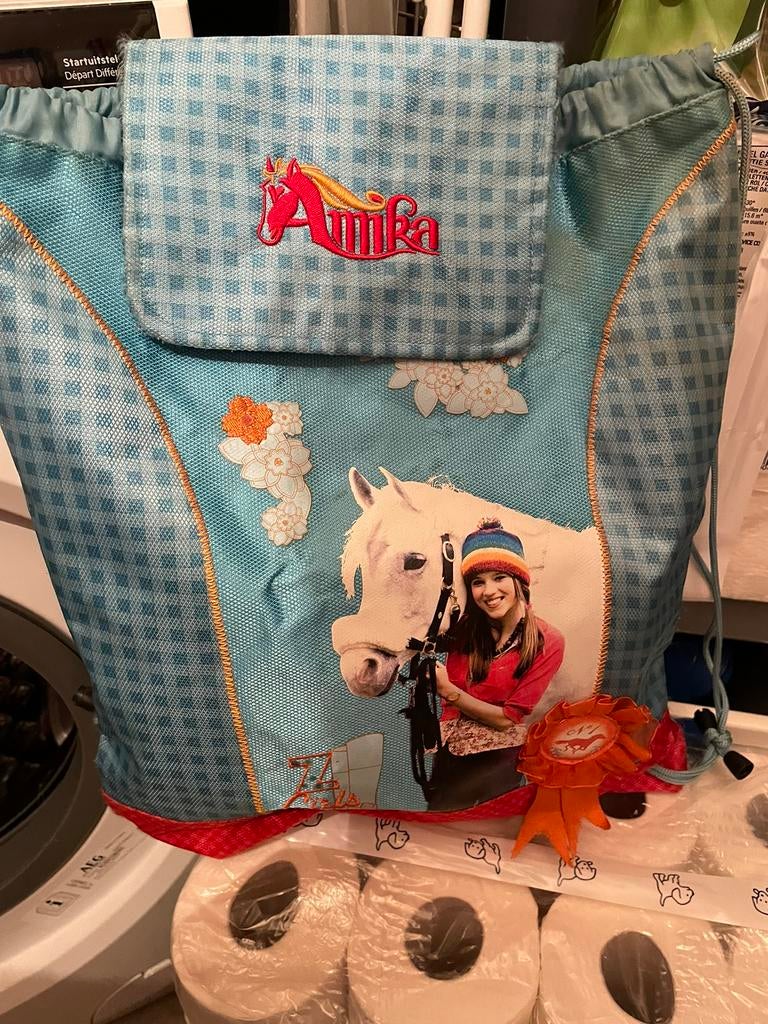 Amika Ruime Zwemzak, Ophalen