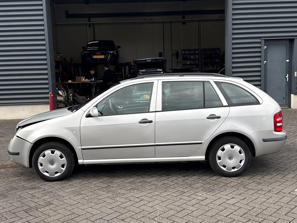 Skoda Fabia Combi 1.4-16V Comfort automaat, Auto's, 450 kg, 4 cilinders, Startonderbreker, 180 g/km
