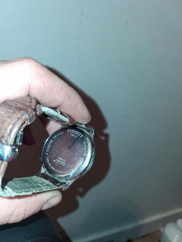TISSOT HORLOGE MODELNR.T063610A, Handtassen en Accessoires, Horloges | Antiek, Polshorloge, Tissot, Staal, 1960 of later, Met bandje