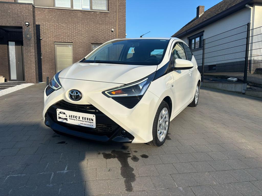 Toyota Aygo 1.0 Benzine | Cruise | Camera | Garantie, Auto's, Toyota, Voorwielaandrijving, 4 deurs, Stof, Wit