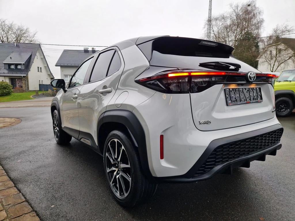 Toyota Yaris Cross GR Sport (bj 2023, automaat), Auto's, Toyota, Automaat, Gebruikt, 750 kg, Wit