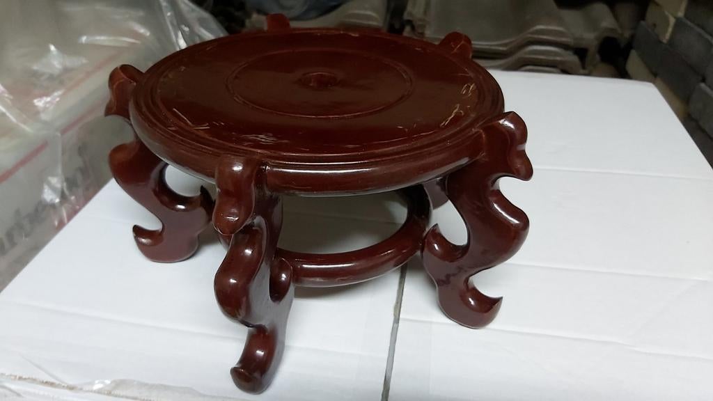 Houten bloemenstaander, Ophalen