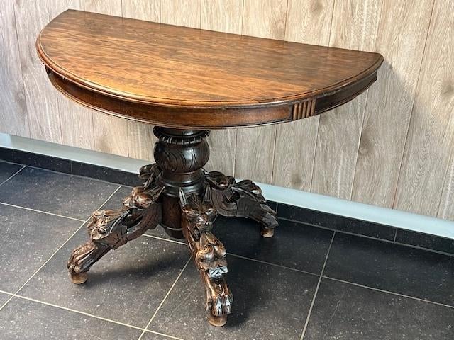 Antieke tafel met ornamentale poot, Ophalen