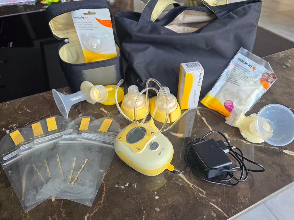 Dubbele elektrische 2-phase borstkolf Medela Freestyle, Kinderen en Baby's, Ophalen of Verzenden, Borstkolf