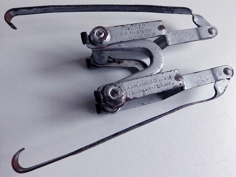 Potdekselklemspanner., Ophalen