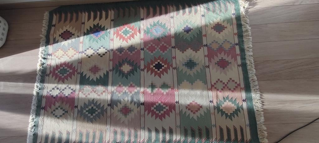 Handgeweven tapijt uit katoen., Ophalen